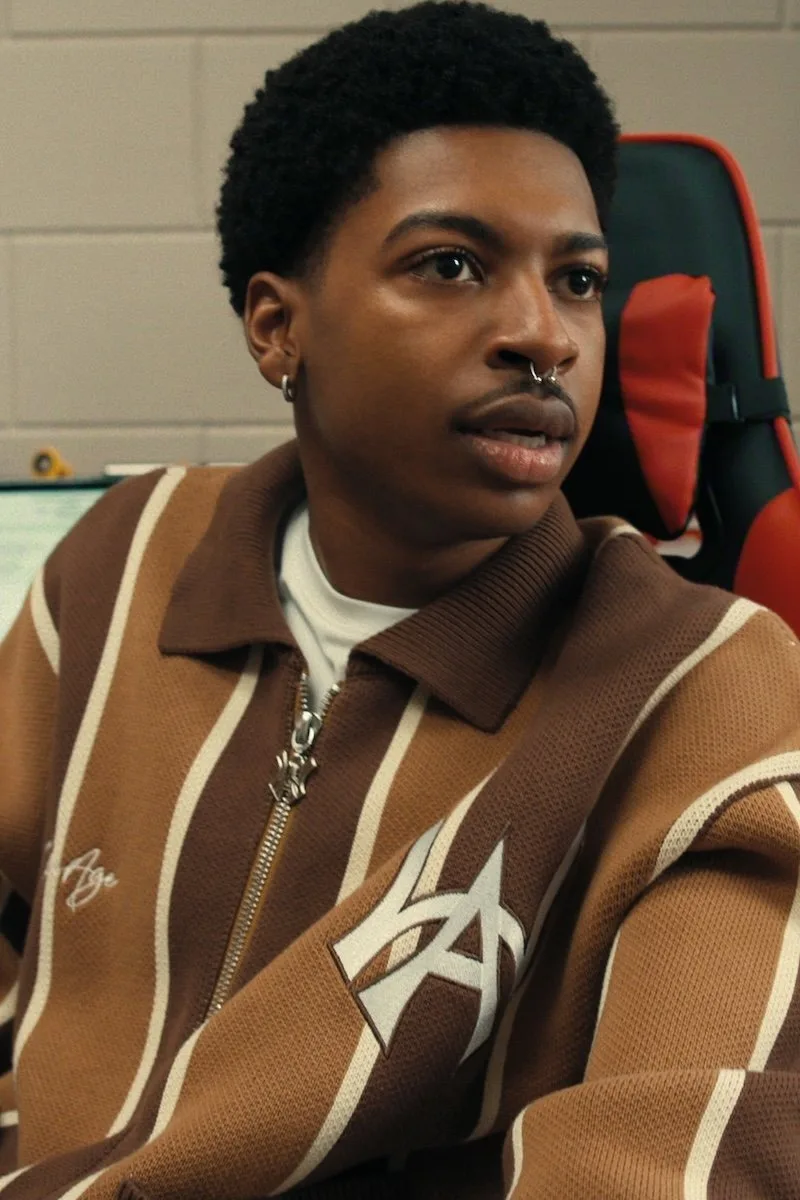 Amir in a Wisdom of Age striped zip cardigan